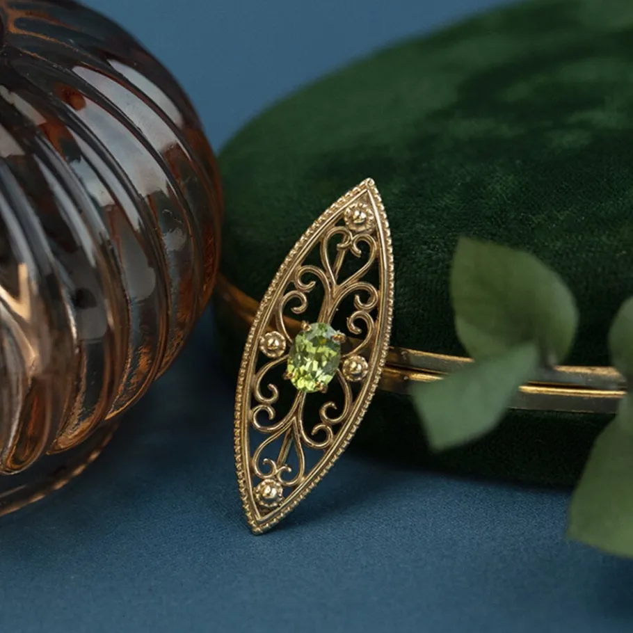 Brooch with peridote 9 krt>Vintage Jewellery Outlet
