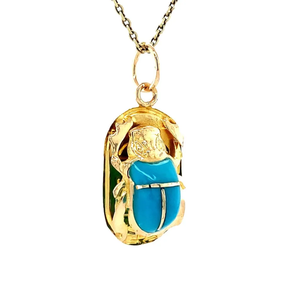 gold_beetle_pendant_with__2.webp Gold beetle pendant with blue colour stone 18 krt>Vintage Jewellery Online