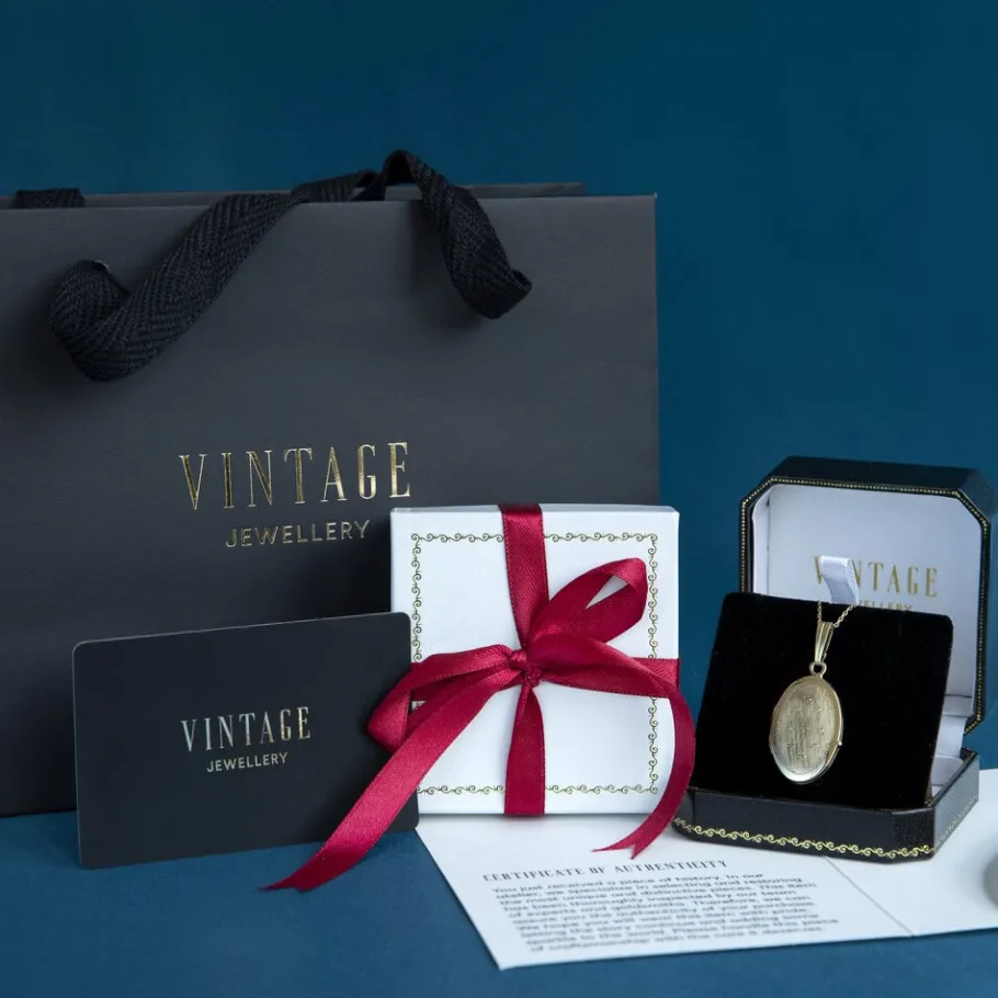 gold_heart_pendant_with_c_5.webp Gold heart pendant with cupid 14 krt>Vintage Jewellery Sale